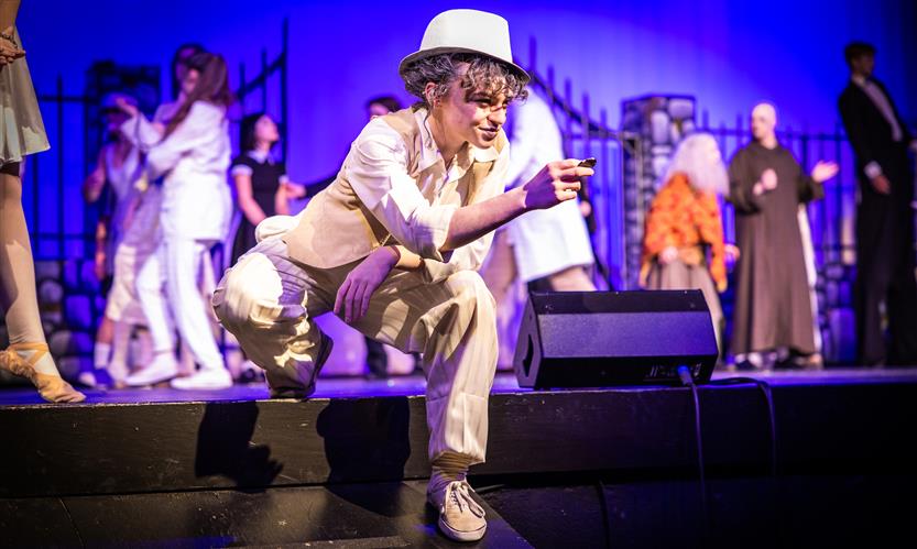 Students perform onstage